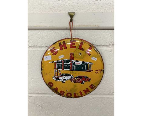 Small circular enamel sign marked Shell Gasoline
