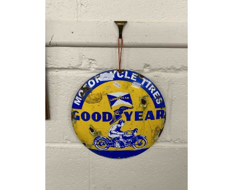 Small circular enamel sign marked Goodyear