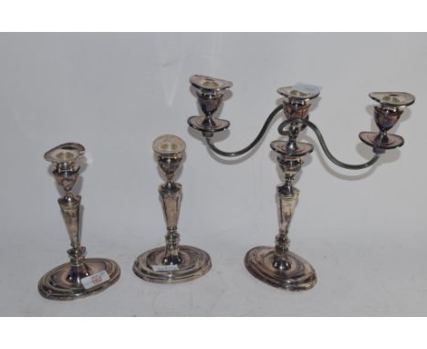 PAIR OF PLATED CANDLESTICKS AND FURTHER PLATED CANDELABRA