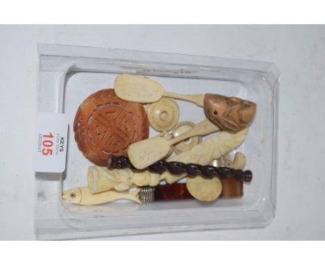 SMALL PLASTIC DISH CONTAINING BONE AND OTHER ITEMS INCLUDING A NETSUKE MODELLED AS A RABBIT