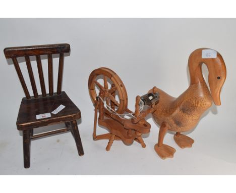 MODEL OF A CHAIR WITH A WOODEN SPINNING WHEEL AND A MODEL OF A DUCK