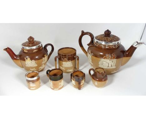 A collection of Doulton salt-glazed stoneware, to include a bachelor's teapot in the harvest pattern, having a silver mounted