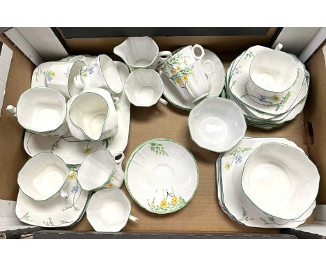 A Heathcote floral decorated part tea service
