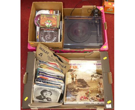 A collection of various LPs and singles to include some signed items by Al Lee, LPs by Nat King Cole, a record player and a s