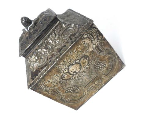 A white metal tea caddy, having a pineapple finial, repousse decorated with scrolls and flowers, h.12.5cm, 12.6ozt
