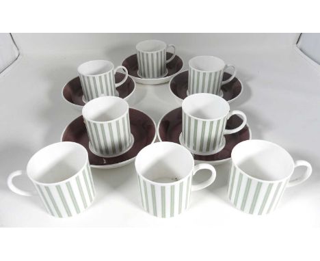 A Susie Cooper part coffee service, comprising eight cups and five saucers