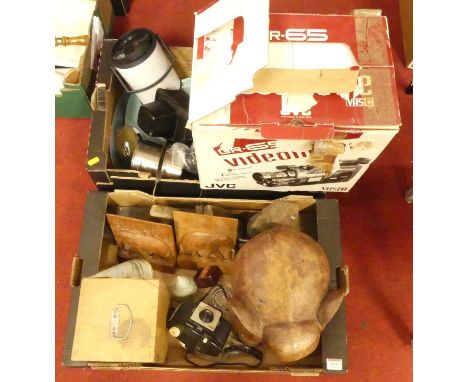 Four boxes of miscellaneous items to include a wooden elephant, Kodak camera, various kitchenware, a JVC video camera,etc