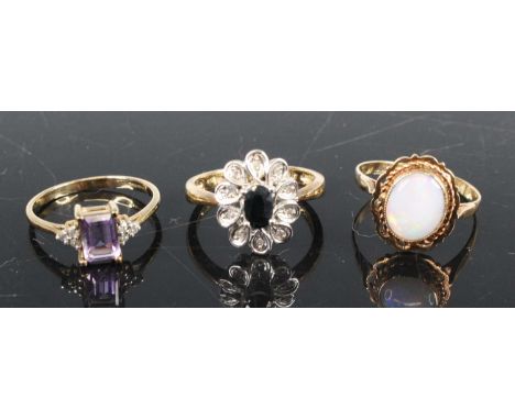 A modern 9ct gold sapphire and diamond point set flowerhead cluster ring, size O/P, together with two other 9ct gold semi-pre