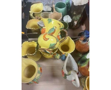 Two boxes of various jugs, to include Wade, Burley ware etc
