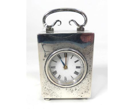 A George V silver cased miniature carriage clock, having a platform escapement, London 1913, h.10cmOverwound.Light dents to t