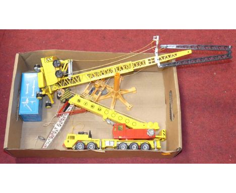 A Siku scale diecast model of a crane; together with various others 