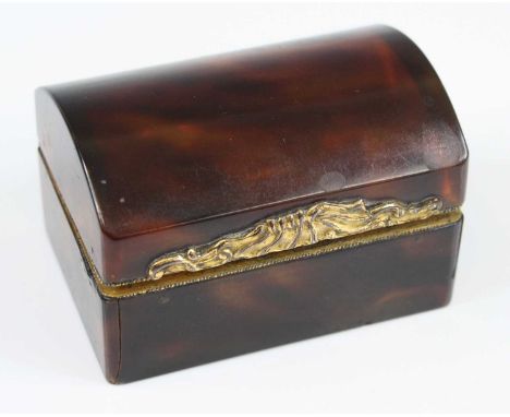 A 19th century tortoiseshell snuff box, the hinged domed cover with gilt metal shell thumbpiece and interior frame, w.6, d.4,