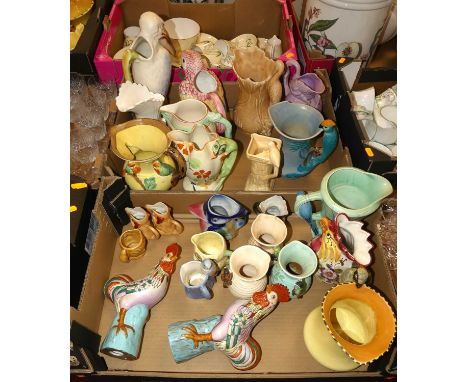 Two boxes of various jugs to include examples by Wade, Burley ware etc
