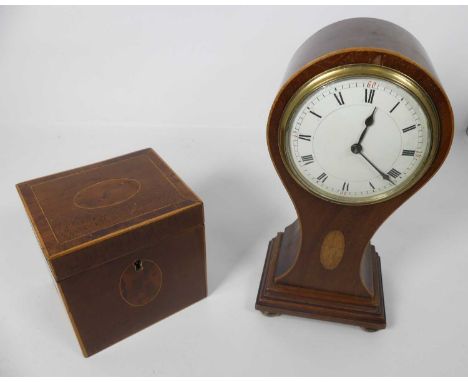 An Edwardian mahogany cased and satinwood strung mantel clock of balloon shape, height 24cm, together with a 19th century fid