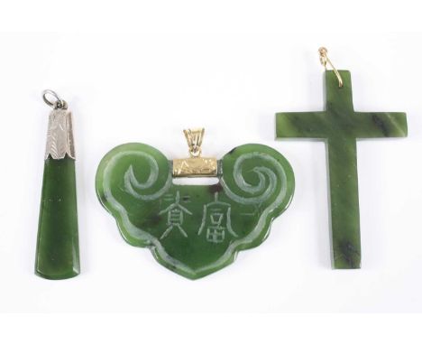 A small collection of costume jewellery to include a Chinese nephrite jade pendant of batwing shape suspended from a yellow m
