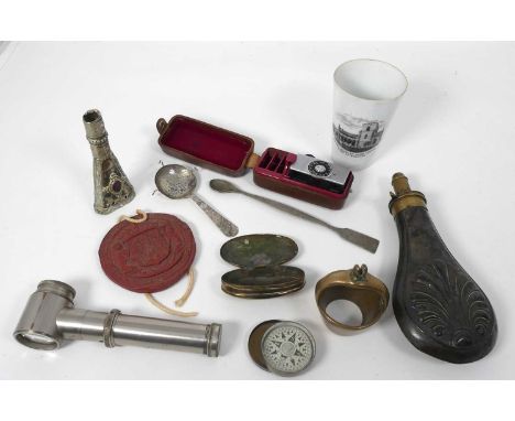 A collection of miscellaneous items to include a copper powder flask, a brass tobacco box, a wax seal