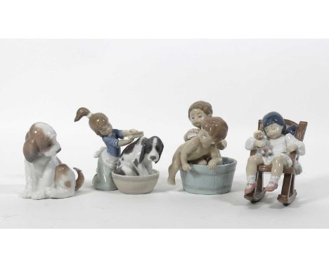 Four Lladro figures 'Bashful Bather' no.05455, 'Naptime' no.05448, 'Bath Time' no.06411, 'Gentle Surprise' no.010.06210, all 