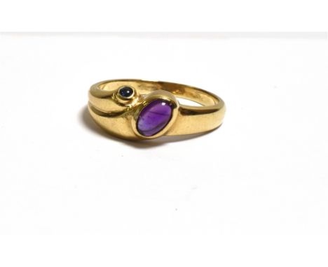 AMETHYST &amp; SAPPHIRE DRESS RING bezel set with an oval cabochon amethyst and a round cabochon sapphire in a designer style
