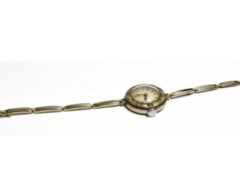 LADIES 18CT WHITE GOLD ART DECO WATCH 22.7mm diameter round case, Swiss hallmarked 0.750 inside back cover, manual wind, the 