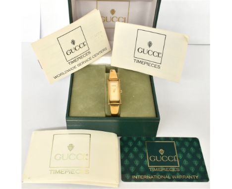 LADIES GUCCI WRISTWATCH 12.2mm wide rectangular gold plated case, signed Gucci reference 1500, mother of pearl dial.  Fitted 