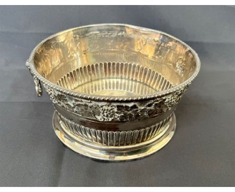 EDWARDIAN SILVER FRUIT BOWL Decorated with grape vine motif repousse work, and handles featuring Rams head masks.  Diameter 1