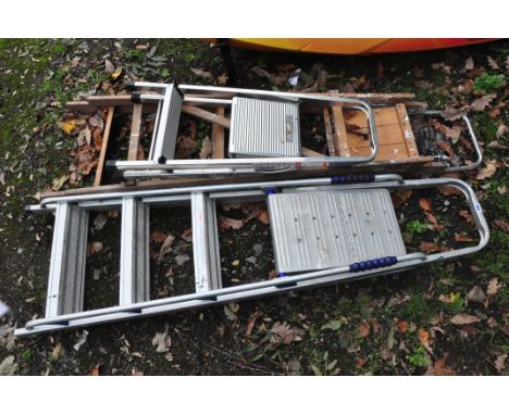 TWO ALUMINIUM AND ONE WOODEN STEP LADDERS the largest being 177cm high (3)