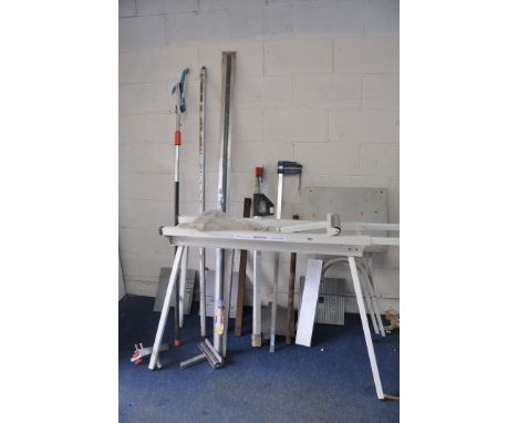 AN AXMINSTER TOOLS FOLDING MITRE SAW STAND with two roller attachments (incomplete) 110cm long x 92cm high, a Stanley Telesco