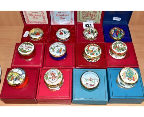A COLLECTION OF BOXED HALCYON DAYS AND OTHER ENAMEL CHRISTMAS TRINKET BOXES, comprising Halcyon Days boxes dated Christmas 19