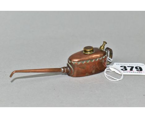 A MECCANO COPPER AND BRASS OIL CAN, engraved 'K' to the front, working pump, stamped to the base, overall length 10.5cm