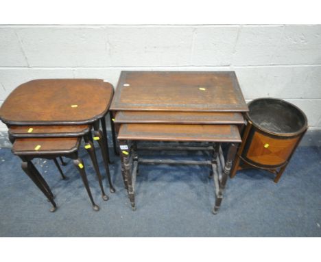 A 20TH CENTURY MAHOGANY NEST OF THREE TABLES, with carved foliate detail to edge, on turned legs, largest width 62cm x depth 
