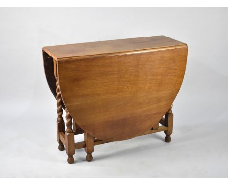 A Mid 20th Century Light Oak Drop Leaf Barley Twist Gate Leg Table, 91cms Long 