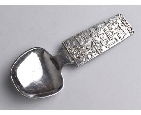 A Swedish Hallberg Caddy Spoon with Relief Design Decorated with Scenes from Stockholm 