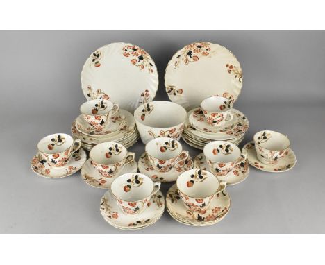 An Edwardian Floral Decorated Tea Set of Wrythen Form to Comprise Nine Cups, Twelve Saucers, Twelve Side Plates, Two Cake Pla