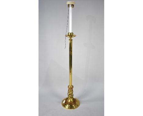 A Modern Brass Standard Lamp with Octagonal Support and Circular Base 