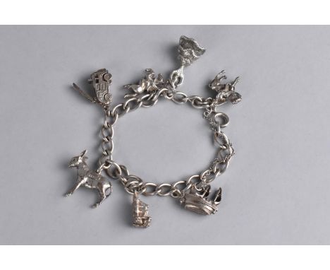 An Early/Mid 20th Century Silver Charm Bracelet having Seven Various Charms to include Horse and Jockey, Mounted Cavalryman, 
