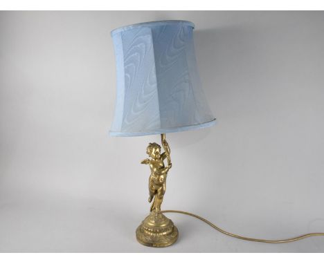 A Mid 20th Century Brass Figural Table Lamp, Support in the Form of Cherub with Vine, Complete with Shade 