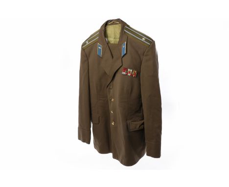 INTERESTING COLLECTION OF 20TH CENTURY RUSSIAN MILITARIA to include an officer's uniform (jacket and trousers), another jacke