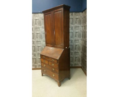 LATE GEORGE III MAHOGANY BUREAU BOOKCASE the lofty cornice with adjustable shelving below, enclosed by two raised and fielded