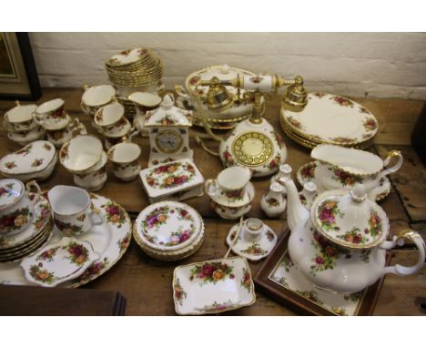 A quantity of Royal Albert  Old Country Roses pattern dinner and tea wares, along with a telephone, a tureen and cover, a clo