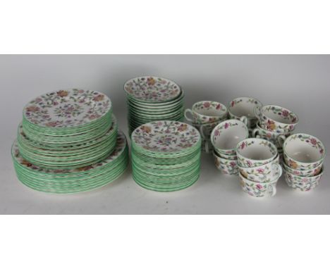A large quantity of Minton, Haddon Hall pattern dinner, breakfast and tea wares, to include; a bowl 22.5cm diameter, a pair o