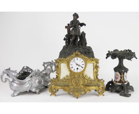 A late 19th century French spelter, brass and alabaster mantel clock, replaced movement, a French porcelain mounted cast meta