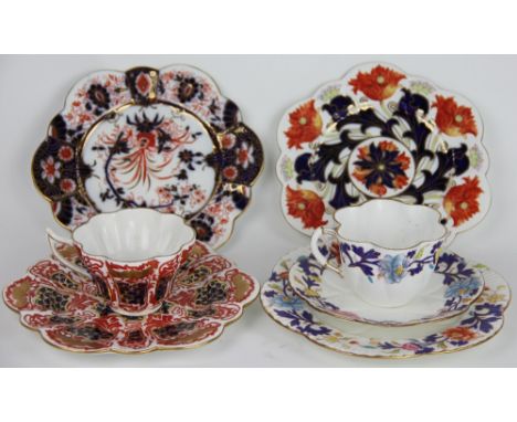 A Foley China Wileman Shelley trio, hexafoil shape, decorated with flowers, with a Foley China Wileman Shelly cup and plate, 