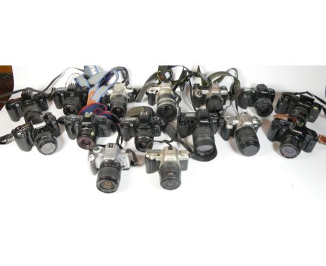 Twenty five SLR vintage film cameras to include a Minolta 404si, a Canon EOS 3000, an Olympus OM101 and a Minolta 500si 