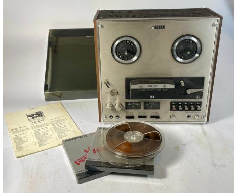 A Sony TC-645 reel to reel player with original operators manual. 
