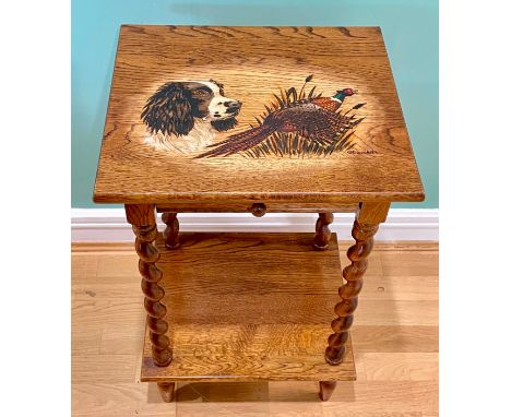 A 20th century oak side table with pokerwork decorated top, signed G. Gundill, having single drawer and lower tier with barle