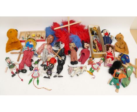A collection of 20th century children's puppets, to include a boxed Pelham string example, film and TV characters - Sooty, Sw