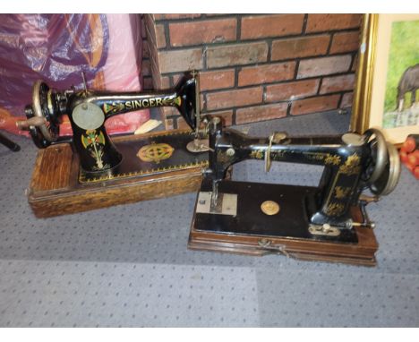 An early 20th century cased Whelen &amp; Wilson manual sewing machine, together with a cased Singer sewing machine. (2) 