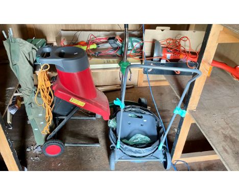 A collection of garden equipment, to include electric shredder, strimmer, hedge cutter, blow torch, a planter carrier/caddy a