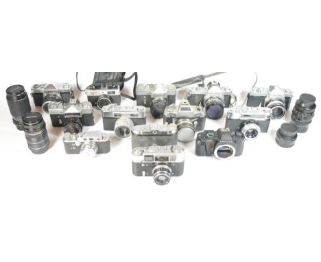 Thirteen SLR vintage film cameras to include a Zenit B, an EXA IIb, a Kowa SE, and a Ricoh 500RF. Together with five mixed le