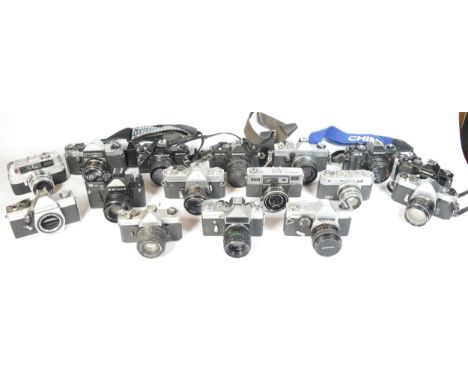 Twenty one SLR vintage film cameras to include a Praktica LB, a Fujica STX-1, a Chinon CM4S, and a Yashica TL 